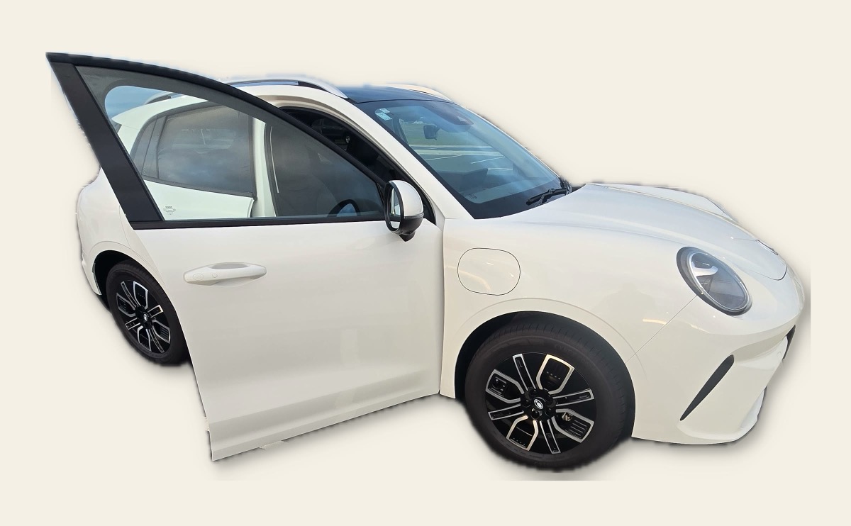 Our white GWM Ora 5 Ultra with the driver's door open.